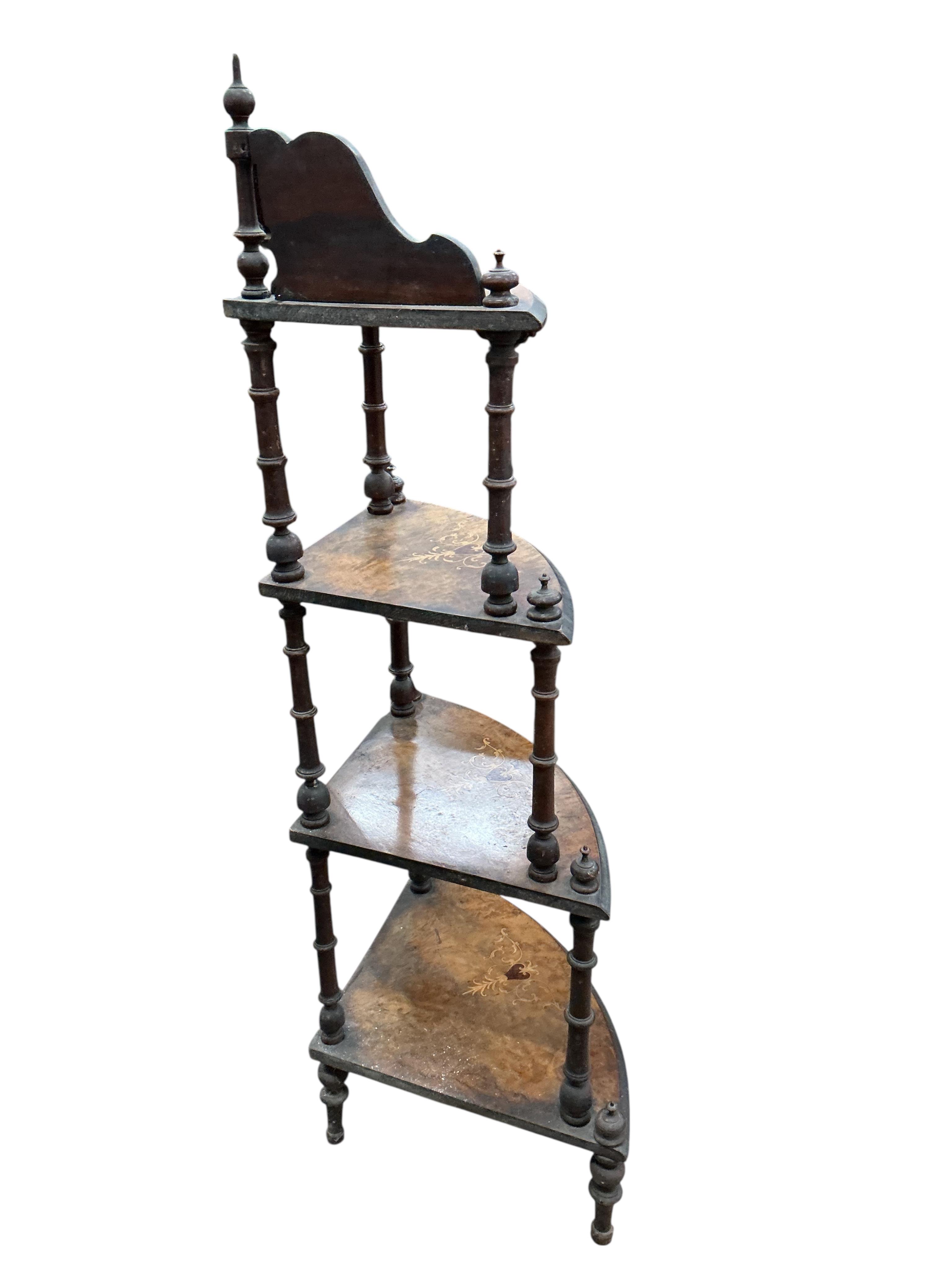 A Victorian inlaid walnut corner whatnot, width 64cm, depth 40cm, height 132cm.